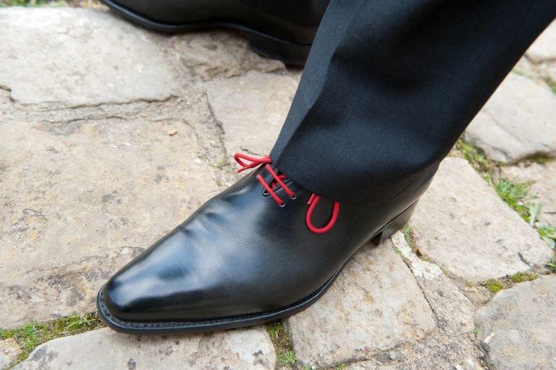 Polished black leather shoe